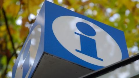 info symbol on a blue block