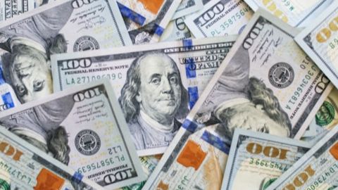 Pile of 100 dollar bills